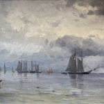 Under a gray overcast sky, a group of large sail boats are clustered together in the distance while one inches middle distance awaits the arrival of a small dingy. An empty dingy is moored in the left foreground.